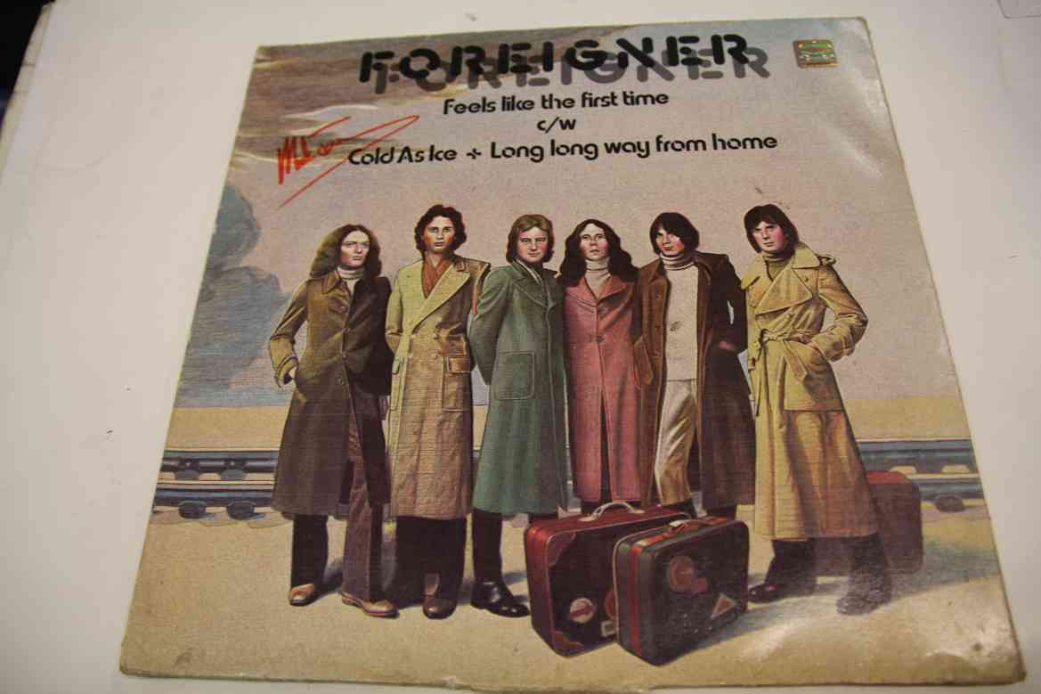 FOREIGNER - FEELS LIKE THE FIRST TIME - ORIGINAL SIGNED